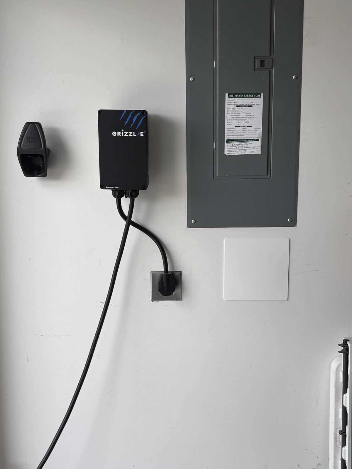 EV charger and panel by Saters Electric