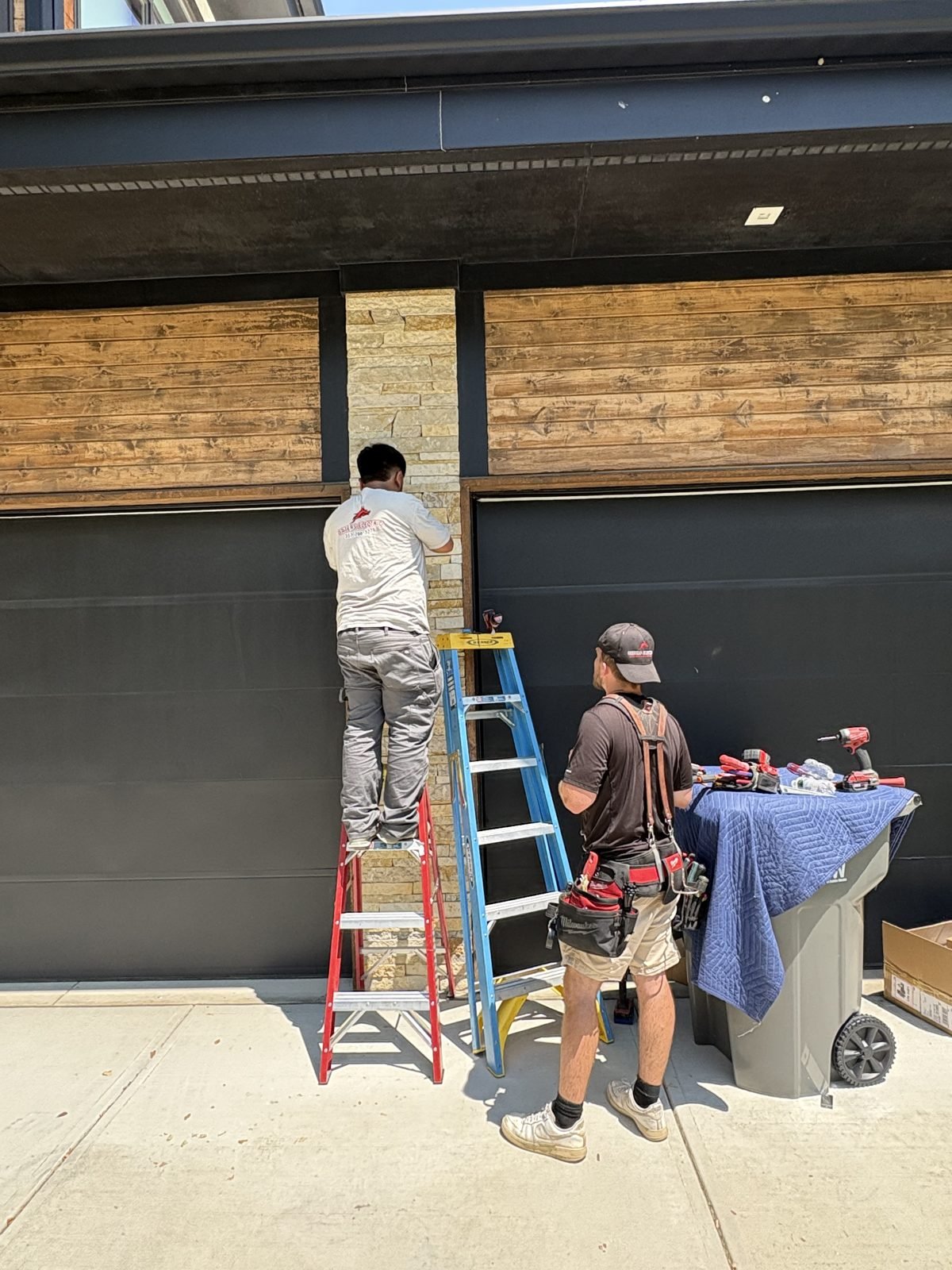 Exterior garage lighting install by Saters Electric