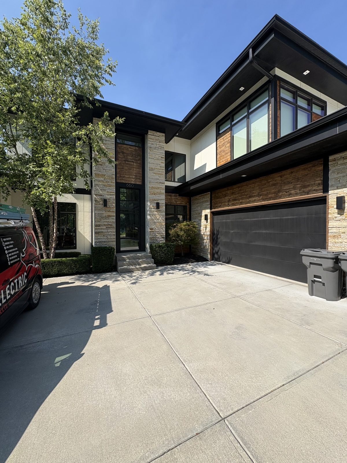 Modern home exterior by Saters Electric